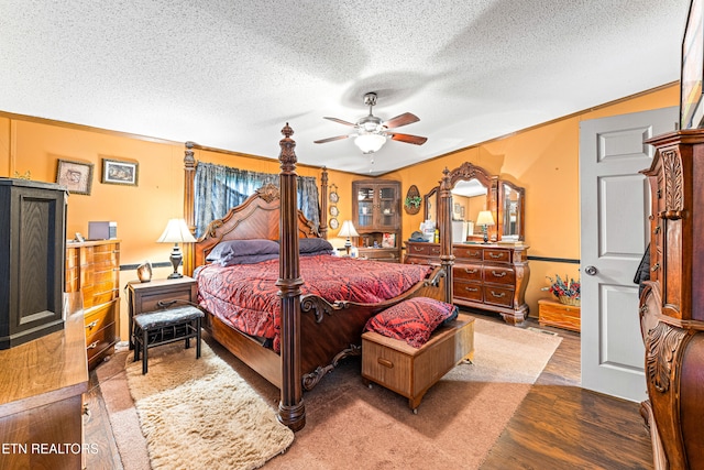 7726 Misty Point Way, Knoxville, TN 37914 - bedroom featuring a textured ceiling, wood finished floors, and a ceiling fan