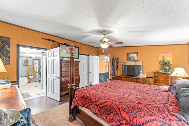 7726 Misty Point Way, Knoxville, TN 37914 - bedroom featuring wood finished floors, a textured ceiling, a ceiling fan, and crown molding