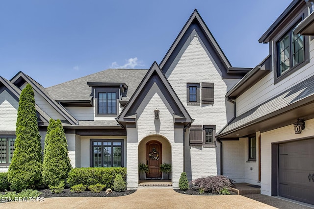 180 Edgewater Way, Lenoir City, TN 37772 - view of front of home with brick siding and roof with shingles