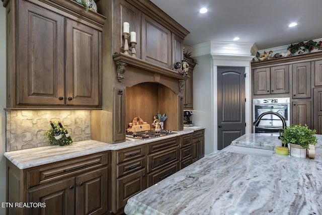 180 Edgewater Way, Lenoir City, TN 37772 - bar area with ornamental molding, backsplash, stainless steel appliances, and recessed lighting