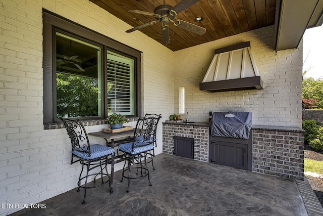 180 Edgewater Way, Lenoir City, TN 37772 - view of patio / terrace with exterior kitchen, a ceiling fan, and a grill