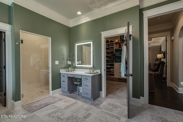 180 Edgewater Way, Lenoir City, TN 37772 - full bathroom with ornamental molding, a stall shower, a walk in closet, vanity, and baseboards