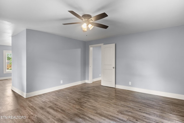 501 Ferry St, Loudon, TN 37774 - spare room featuring ceiling fan, wood finished floors, and baseboards