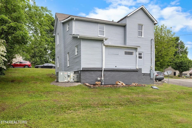 501 Ferry St, Loudon, TN 37774 - rear view of property with a yard and central air condition unit