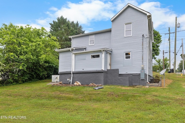501 Ferry St, Loudon, TN 37774 - back of house featuring a yard