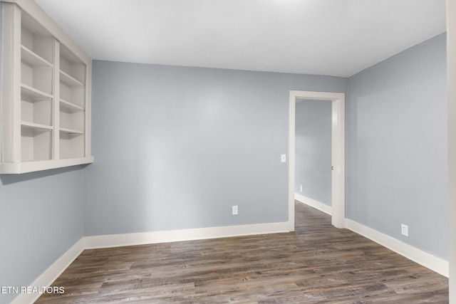 501 Ferry St, Loudon, TN 37774 - empty room featuring wood finished floors and baseboards