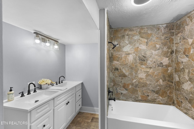 501 Ferry St, Loudon, TN 37774 - bathroom with washtub / shower combination, a textured ceiling, and double vanity