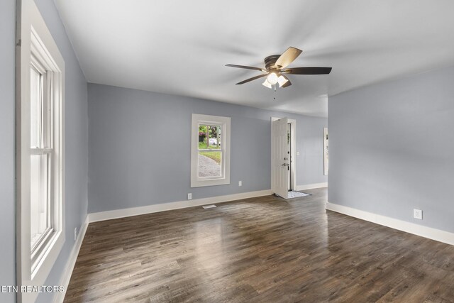 501 Ferry St, Loudon, TN 37774 - spare room with a ceiling fan, baseboards, and dark wood-style flooring