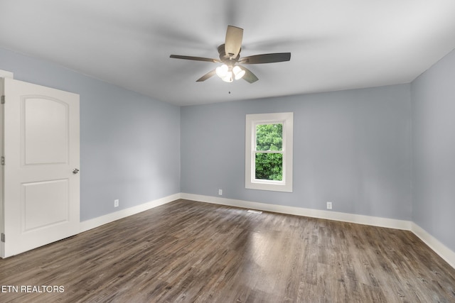 501 Ferry St, Loudon, TN 37774 - unfurnished room with a ceiling fan, wood finished floors, and baseboards