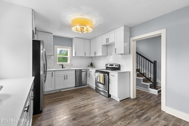 501 Ferry St, Loudon, TN 37774 - kitchen featuring stainless steel appliances, backsplash, a sink, and light countertops