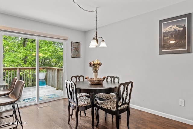 10212 Birch Hill Ln, Knoxville, TN 37932 - dining area featuring a chandelier, baseboards, and dark wood finished floors
