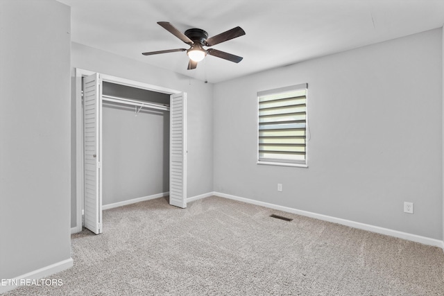 10212 Birch Hill Ln, Knoxville, TN 37932 - unfurnished bedroom featuring carpet, a closet, baseboards, and ceiling fan