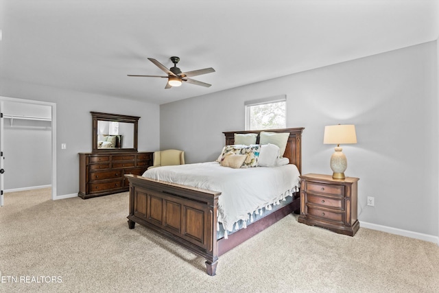 10212 Birch Hill Ln, Knoxville, TN 37932 - bedroom featuring light carpet, baseboards, and a ceiling fan