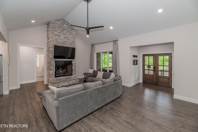 8304 Davis Ferry Rd, Loudon, TN 37774 - living area featuring dark wood-style flooring, a healthy amount of sunlight, a fireplace, and vaulted ceiling