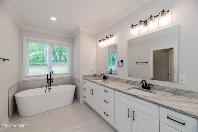 8304 Davis Ferry Rd, Loudon, TN 37774 - bathroom with marble finish floor, a freestanding bath, a sink, and double vanity