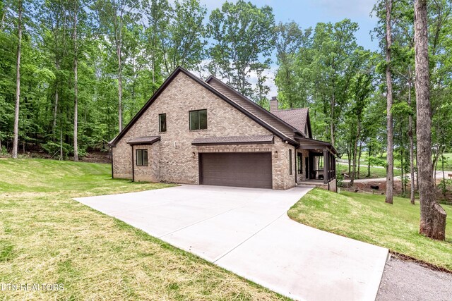 8304 Davis Ferry Rd, Loudon, TN 37774 - view of front of property with brick siding, driveway, a chimney, and a front yard