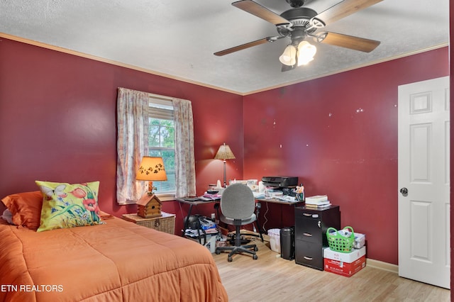 217 Jackson Dr, Harriman, TN 37748 - bedroom with wood finished floors, an office area, baseboards, and a ceiling fan