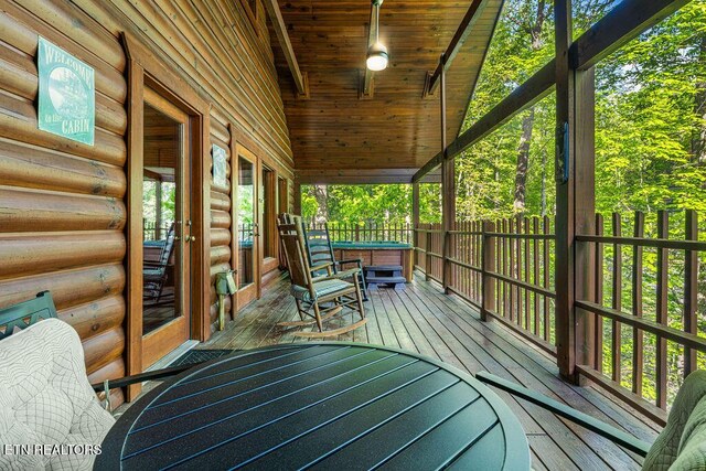 614 Hillybilly Haven Way, Gatlinburg, TN 37738 - wooden terrace with a hot tub and fence