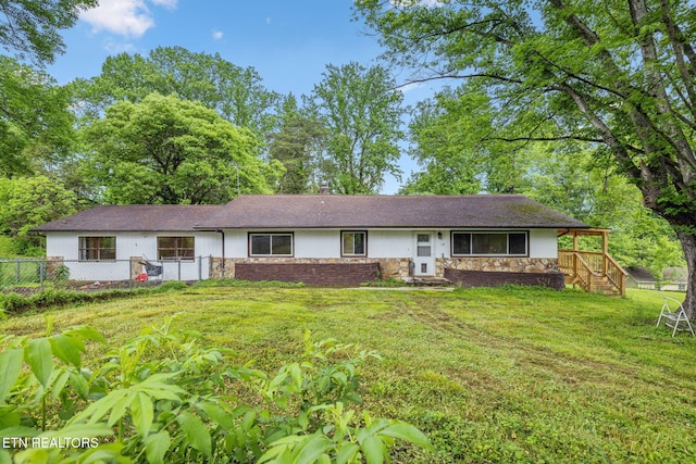 138 Lilac Dr, Lafollette, TN 37766 - single story home featuring stone siding and stucco siding