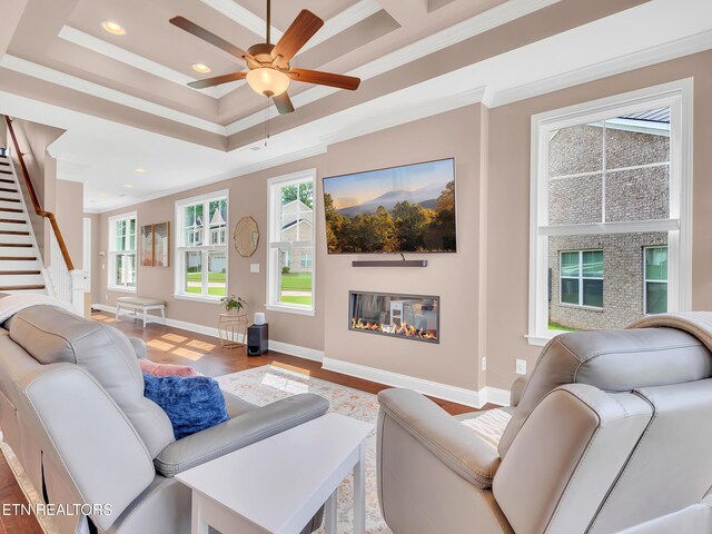 11842 Gecko Dr, Knoxville, TN 37932 - living area with ornamental molding, wood finished floors, ceiling fan, recessed lighting, and baseboards