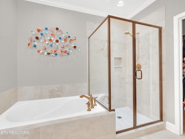11842 Gecko Dr, Knoxville, TN 37932 - bathroom featuring a stall shower, a bath, ornamental molding, and recessed lighting