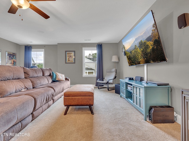 11842 Gecko Dr, Knoxville, TN 37932 - living room featuring light colored carpet, plenty of natural light, and a ceiling fan