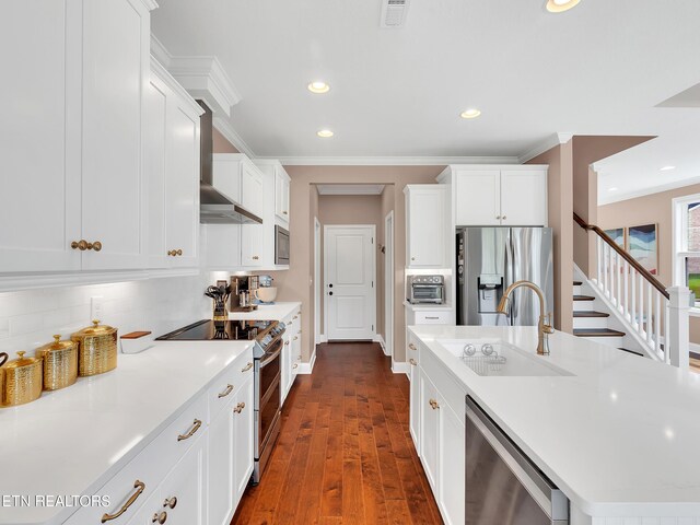 11842 Gecko Dr, Knoxville, TN 37932 - kitchen with stainless steel appliances, a sink, decorative backsplash, crown molding, and light countertops