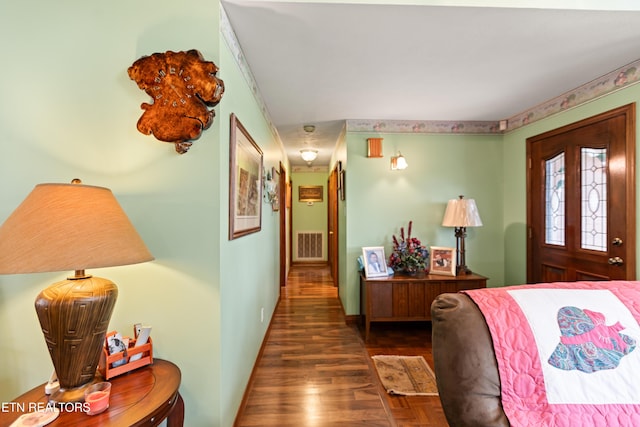 bedroom featuring wood finished floors