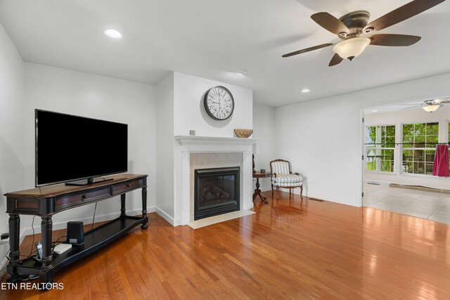 687 Burchfield Rd, Dandridge, TN 37725 - living area with a ceiling fan, wood finished floors, recessed lighting, and a fireplace