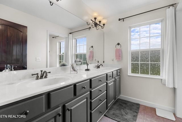 687 Burchfield Rd, Dandridge, TN 37725 - bathroom featuring double vanity, baseboards, and tile patterned floors