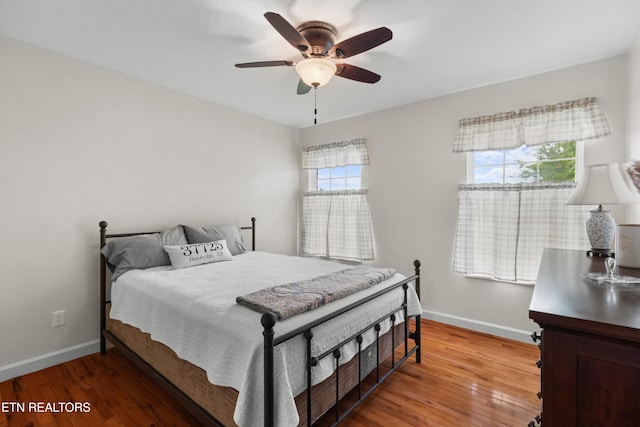 687 Burchfield Rd, Dandridge, TN 37725 - bedroom featuring light wood-type flooring, baseboards, and a ceiling fan