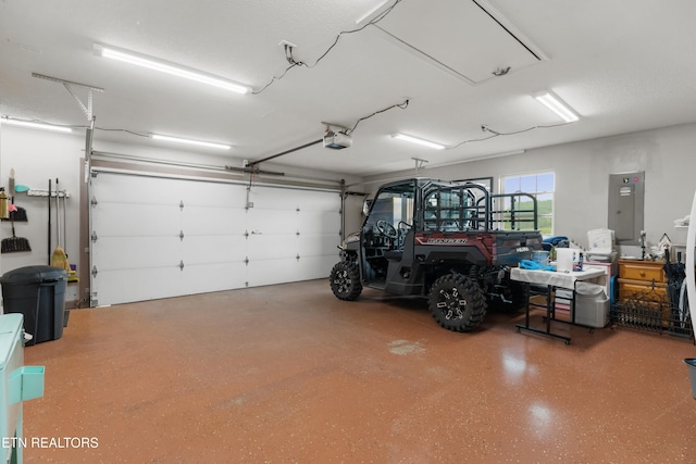 687 Burchfield Rd, Dandridge, TN 37725 - garage with a garage door opener and electric panel