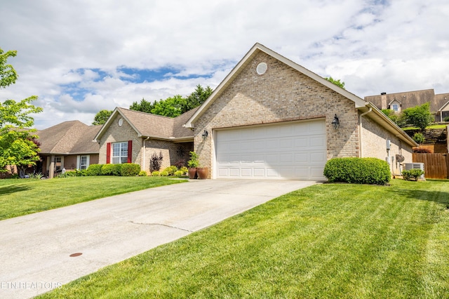 ranch-style home featuring brick siding, an attached garage, driveway, and a front yard