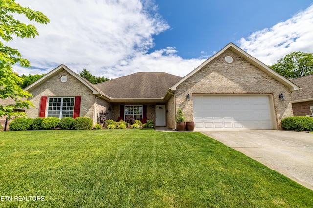 ranch-style house with brick siding, an attached garage, concrete driveway, and a front lawn
