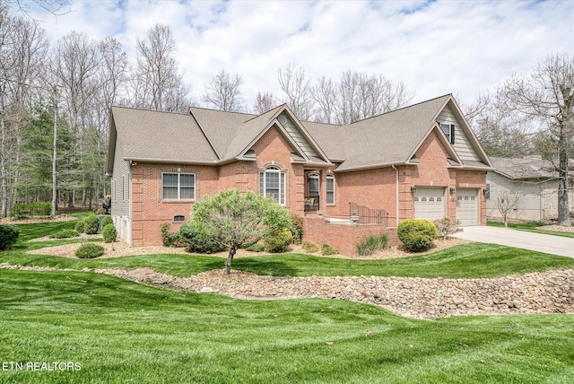 13 Holly Ct, Crossville, TN 38558 - view of front of house with brick siding, driveway, a front yard, and an attached garage