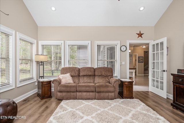 13 Holly Ct, Crossville, TN 38558 - living room with baseboards, wood finished floors, french doors, recessed lighting, and lofted ceiling