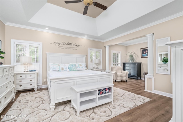 13 Holly Ct, Crossville, TN 38558 - bedroom with decorative columns, dark wood-type flooring, multiple windows, ornamental molding, and recessed lighting