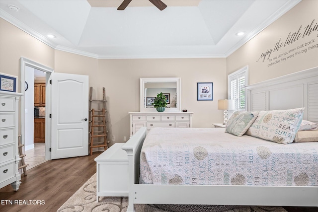 13 Holly Ct, Crossville, TN 38558 - bedroom featuring crown molding, wood finished floors, a tray ceiling, a ceiling fan, and recessed lighting