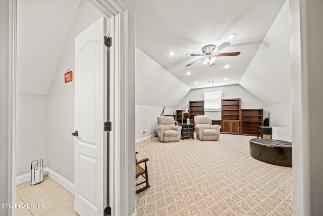 13 Holly Ct, Crossville, TN 38558 - bonus room with lofted ceiling, a ceiling fan, baseboards, light tile patterned flooring, and a textured ceiling