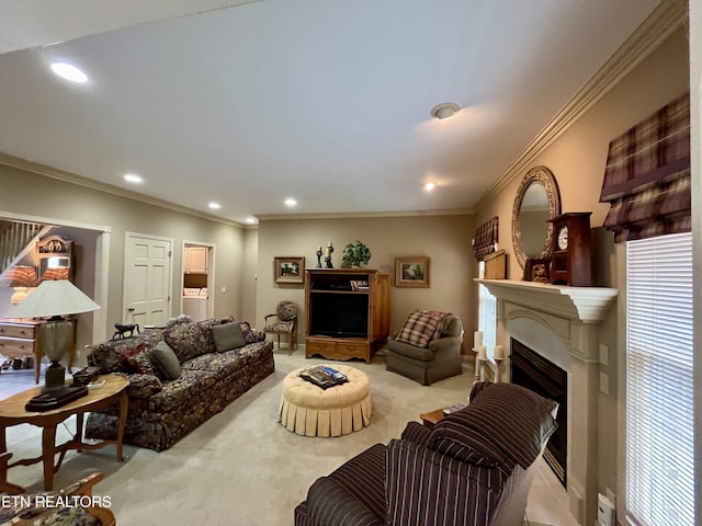 carpeted living room with a fireplace, ornamental molding, and recessed lighting