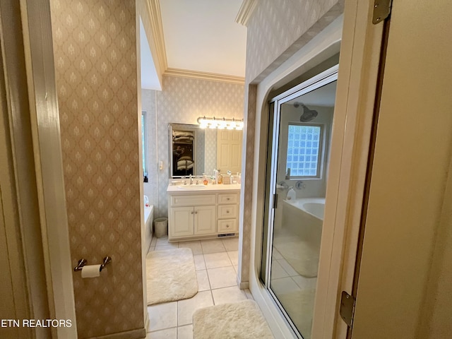 bathroom with tile patterned flooring, a garden tub, vanity, a stall shower, and ornamental molding