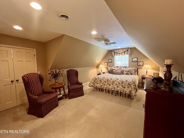 carpeted bedroom with vaulted ceiling, recessed lighting, a ceiling fan, and baseboards