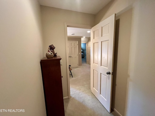 hall with carpet and recessed lighting