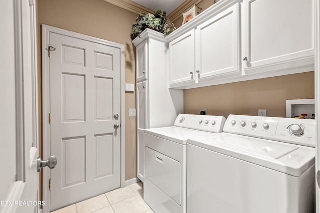 704 Blue Dun Ct, Pigeon Forge, TN 37863 - washroom featuring washer and clothes dryer, cabinet space, light tile patterned floors, and ornamental molding