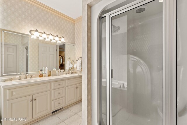 704 Blue Dun Ct, Pigeon Forge, TN 37863 - bathroom featuring wallpapered walls, a stall shower, crown molding, double vanity, and tile patterned floors