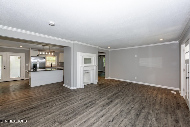 2208 Sanderson Rd, Knoxville, TN 37921 - unfurnished living room with french doors, a sink, dark wood finished floors, baseboards, and ornamental molding