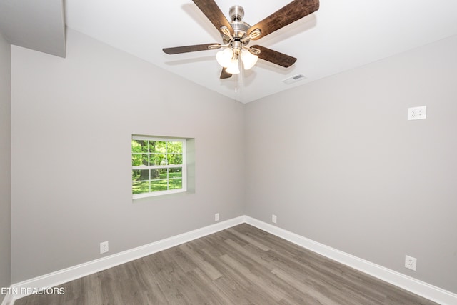 2208 Sanderson Rd, Knoxville, TN 37921 - empty room featuring wood finished floors, a ceiling fan, visible vents, baseboards, and vaulted ceiling