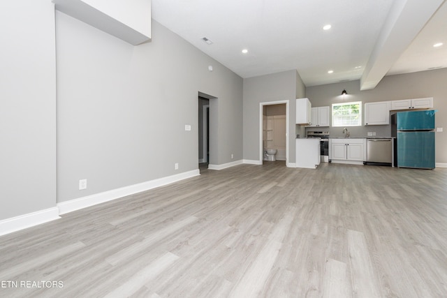 2208 Sanderson Rd, Knoxville, TN 37921 - unfurnished living room featuring light wood-style flooring, visible vents, baseboards, beamed ceiling, and recessed lighting