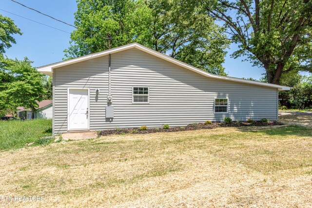 2208 Sanderson Rd, Knoxville, TN 37921 - view of home's exterior featuring a yard
