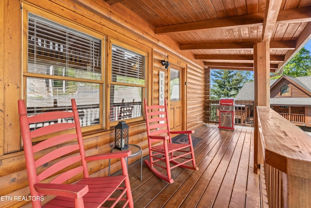 wooden deck featuring a porch